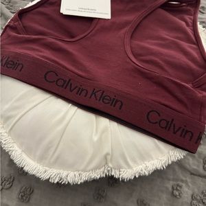 CK unlined women's lounge bra, burgundy, size S, tags attached, unworn.